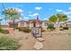 Charming single-story home with desert landscaping, stone walkway, and a two-car garage at 37508 N 12Th St, Phoenix, AZ 85086