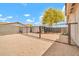 Equestrian property featuring expansive horse area and durable metal fencing for safe and secure containment at 37508 N 12Th St, Phoenix, AZ 85086