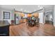 Full kitchen with stainless steel appliances, wood cabinets, granite countertops, and dining table at 37508 N 12Th St, Phoenix, AZ 85086