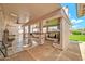An elaborate covered outdoor kitchen with bar and grill, perfect for entertaining in the backyard of the property at 37508 N 12Th St, Phoenix, AZ 85086