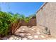 Backyard with low maintenance landscaping and a stone walkway at 4033 E Larkspur Dr, Phoenix, AZ 85032