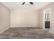 Large bedroom featuring wood-look tile flooring and en-suite bath at 4033 E Larkspur Dr, Phoenix, AZ 85032