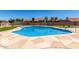A community swimming pool with a stone deck offers a refreshing oasis with ample space for relaxation and recreation at 4033 E Larkspur Dr, Phoenix, AZ 85032