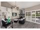 Bright living room with built-in shelving, fireplace, and comfortable seating at 4033 E Larkspur Dr, Phoenix, AZ 85032