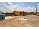 View of the spacious backyard, showcasing the property's potential for outdoor activities and landscaping at 4102 W Maryland Ave, Phoenix, AZ 85019