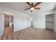 This bedroom includes access to an ensuite bath and a walk-in closet at 4102 W Maryland Ave, Phoenix, AZ 85019