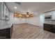 View of the open living space with recessed lighting and wood ceiling accent at 4102 W Maryland Ave, Phoenix, AZ 85019