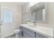 This bathroom features updated cabinets, hardware, and solid surface countertops at 4107 E Fairview Cir, Mesa, AZ 85206