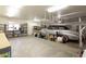 The garage has additional storage space and an classic automobile at 4107 E Fairview Cir, Mesa, AZ 85206