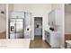 Modern kitchen with stainless steel appliances, and tiled backsplash with modern cabinets at 4107 E Fairview Cir, Mesa, AZ 85206
