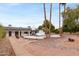 A backyard featuring a pool and patio area, perfect for outdoor entertaining and relaxation at 4107 E Fairview Cir, Mesa, AZ 85206