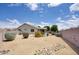 Desert backyard featuring rock features and low-maintenance landscaping at 4141 W Potter Dr, Glendale, AZ 85308