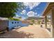 Paver patio features a built-in bench, desert landscaping, and mountain views at 4141 W Potter Dr, Glendale, AZ 85308