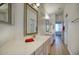 Modern bathroom featuring dual sinks, and a long countertop and vanity space at 4141 W Potter Dr, Glendale, AZ 85308