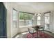 Breakfast nook with large windows and an attached kitchen at 4141 W Potter Dr, Glendale, AZ 85308