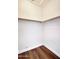 This closet features wooden floors, base trim and a wooden dowel for hanging clothes at 4141 W Potter Dr, Glendale, AZ 85308