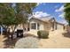 Single-story home featuring desert landscaping, barbecue, patio, and tile roof at 4141 W Potter Dr, Glendale, AZ 85308