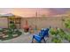 Cozy backyard with comfortable seating, decorative accents, and ambient lighting, creating a relaxing outdoor retreat at 4448 E Sleepy Ranch Rd, Cave Creek, AZ 85331