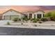 Beautiful single-story home with desert landscaping, a three-car garage, and a charming walkway at 4448 E Sleepy Ranch Rd, Cave Creek, AZ 85331