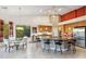 Open-concept kitchen featuring a large island, barstool seating, and stainless steel appliances at 4448 E Sleepy Ranch Rd, Cave Creek, AZ 85331