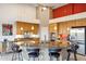 Spacious kitchen featuring a large island, stainless steel appliances, and custom cabinets at 4448 E Sleepy Ranch Rd, Cave Creek, AZ 85331