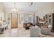 Bright living room featuring stylish furniture, a front door view and a built-in entertainment center at 4448 E Sleepy Ranch Rd, Cave Creek, AZ 85331