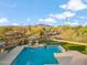 Scenic pool area with desert views, putting green, and lounge chairs, blending recreation with natural beauty at 4448 E Sleepy Ranch Rd, Cave Creek, AZ 85331