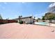 Spacious brick patio and a refreshing pool create an outdoor retreat at 4528 W Butler Dr, Glendale, AZ 85302