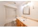Bathroom features include a shower-tub combo, vanity with mirror, and modern fixtures at 4528 W Butler Dr, Glendale, AZ 85302