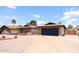 Charming single-story home featuring desert landscaping, brick accents, and a two-car garage at 4528 W Butler Dr, Glendale, AZ 85302