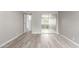 Neutral bedroom features wood-look floors, closet with mirror doors, and open doorway at 4630 N 68Th St # 221, Scottsdale, AZ 85251