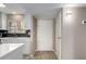 Bright kitchen area leading to the entryway, showcasing modern finishes and design at 4630 N 68Th St # 221, Scottsdale, AZ 85251