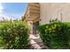Cozy patio area surrounded by lush greenery, perfect for outdoor relaxation at 4630 N 68Th St # 221, Scottsdale, AZ 85251