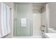 Bathroom featuring sliding glass shower door and updated shower head fixture at 4630 N 68Th St # 221, Scottsdale, AZ 85251