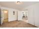 Cozy bedroom with carpet flooring, closet space, and access to other rooms at 5502 N Ormondo Way, Litchfield Park, AZ 85340