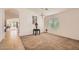 Traditional dining room with neutral carpet, decorative mirror and natural light at 5502 N Ormondo Way, Litchfield Park, AZ 85340