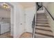 This entryway features a laundry room and staircase to the second story at 5757 S 21St Ter, Phoenix, AZ 85040