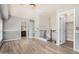 Loft area with wood floors, neutral paint, leading to bathroom and closet at 5757 S 21St Ter, Phoenix, AZ 85040