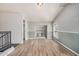 Loft area showcasing wood floors, neutral walls, and access to multiple rooms at 5757 S 21St Ter, Phoenix, AZ 85040