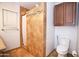 Bathroom featuring a tiled shower and modern toilet at 5941 W Venus Way, Chandler, AZ 85226