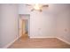 Bedroom boasting wood-look floors, a ceiling fan, and neutral paint at 5941 W Venus Way, Chandler, AZ 85226