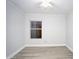 Bright bedroom with wood-look floors and neutral paint at 5941 W Venus Way, Chandler, AZ 85226