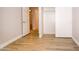 Empty bedroom features hardwood floors, a closet, and an open doorway at 5941 W Venus Way, Chandler, AZ 85226