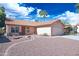 Charming single-story home with a tile roof, desert landscaping, and a two-car garage at 5941 W Venus Way, Chandler, AZ 85226
