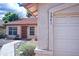 Inviting front of home, security door, and well maintained desert landscape at 5941 W Venus Way, Chandler, AZ 85226