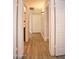 Hallway with attractive laminate flooring and white doors at 5941 W Venus Way, Chandler, AZ 85226