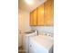 Laundry room with cabinetry, washer, and dryer at 5941 W Venus Way, Chandler, AZ 85226