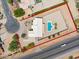 This aerial view highlights a home with a backyard pool and spacious desert landscaping at 616 E Lavitt Ln, Phoenix, AZ 85086