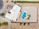 Expansive backyard retreat features a private pool, covered patio, and desert landscaping at 616 E Lavitt Ln, Phoenix, AZ 85086