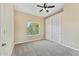 Bedroom with natural light and carpet flooring at 616 E Lavitt Ln, Phoenix, AZ 85086